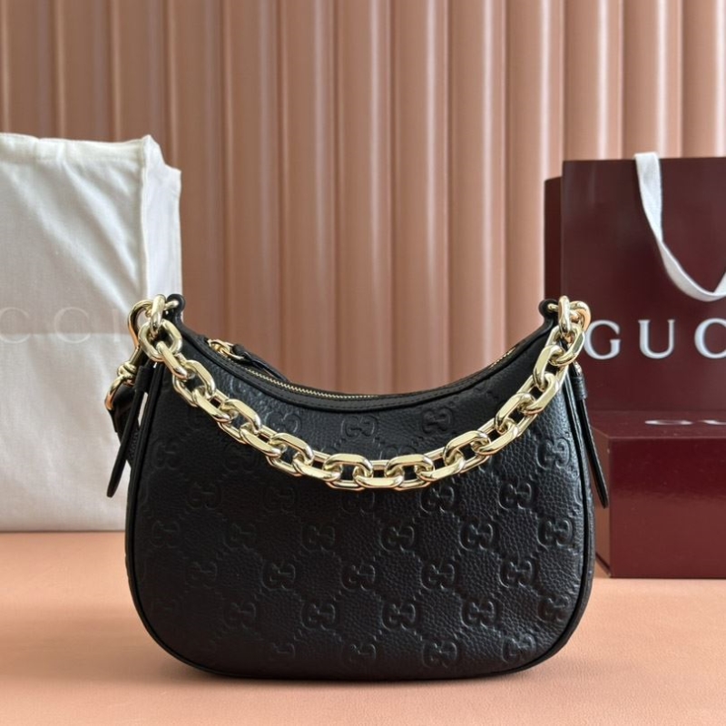 G*u*i satchel bags